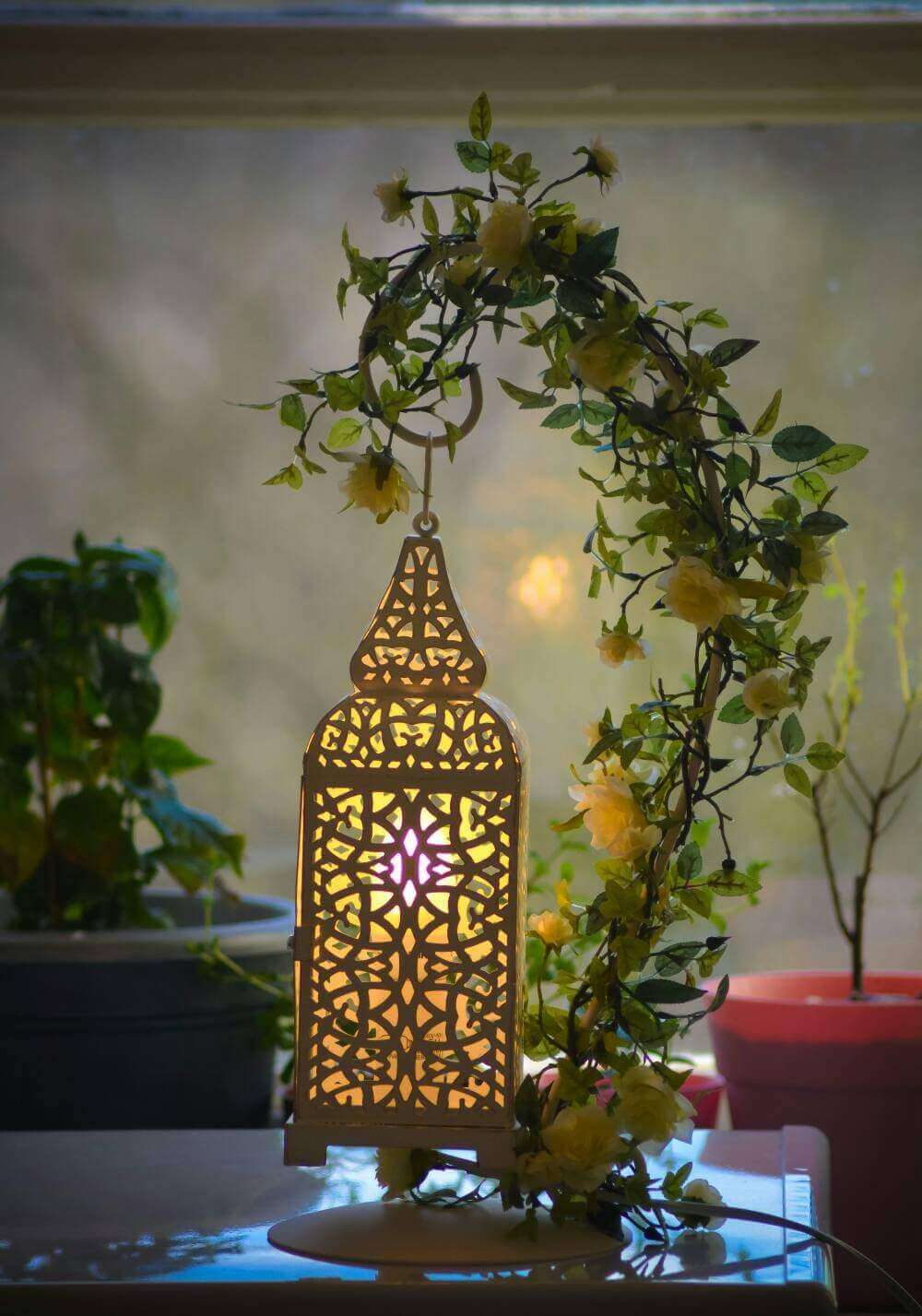 moroccan lantern, eco friendly home decor, boho table lamp, floral lantern light, ambient mood lighting, romantic room decor, sustainable lighting, eco chic decor, ramadan lantern, moroccan wedding centrepiece, bohemian light fixture, energy saving lamp, green lifestyle lighting, ethical home accessories
