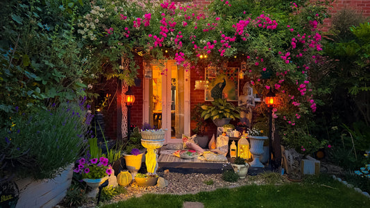Fairytale cottage rose garden on new-build home exterior