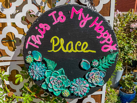 happy place garden sign, handmade garden plaque, resin succulent wall art, slate garden sign UK, cottagecore outdoor decor, inspirational garden quote, uplifting patio sign, handmade slate decor, colourful succulent sign, outdoor hanging plaque, positive garden message, weatherproof garden art, gift for garden lovers, rustic garden decor, cheerful outdoor sign