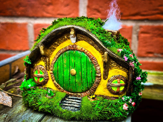 Hobbit house fairy garden, Handcrafted miniature house, Moss-covered fairy home, Enchanted fairy garden decor, Fantasy cottage home decor, Fairy garden house handmade, Hobbit home decoration, Miniature moss house, Whimsical home decor, Moss fairy garden house, Tolkien-inspired home decor, Handmade fairy house gift, Hobbit house for terrariums, Storybook cottage decoration, Enchanted garden accessories, Fairy garden display ideas, Eco-friendly fantasy decor, Buy fairy garden hobbit house, Unique handcrafted 