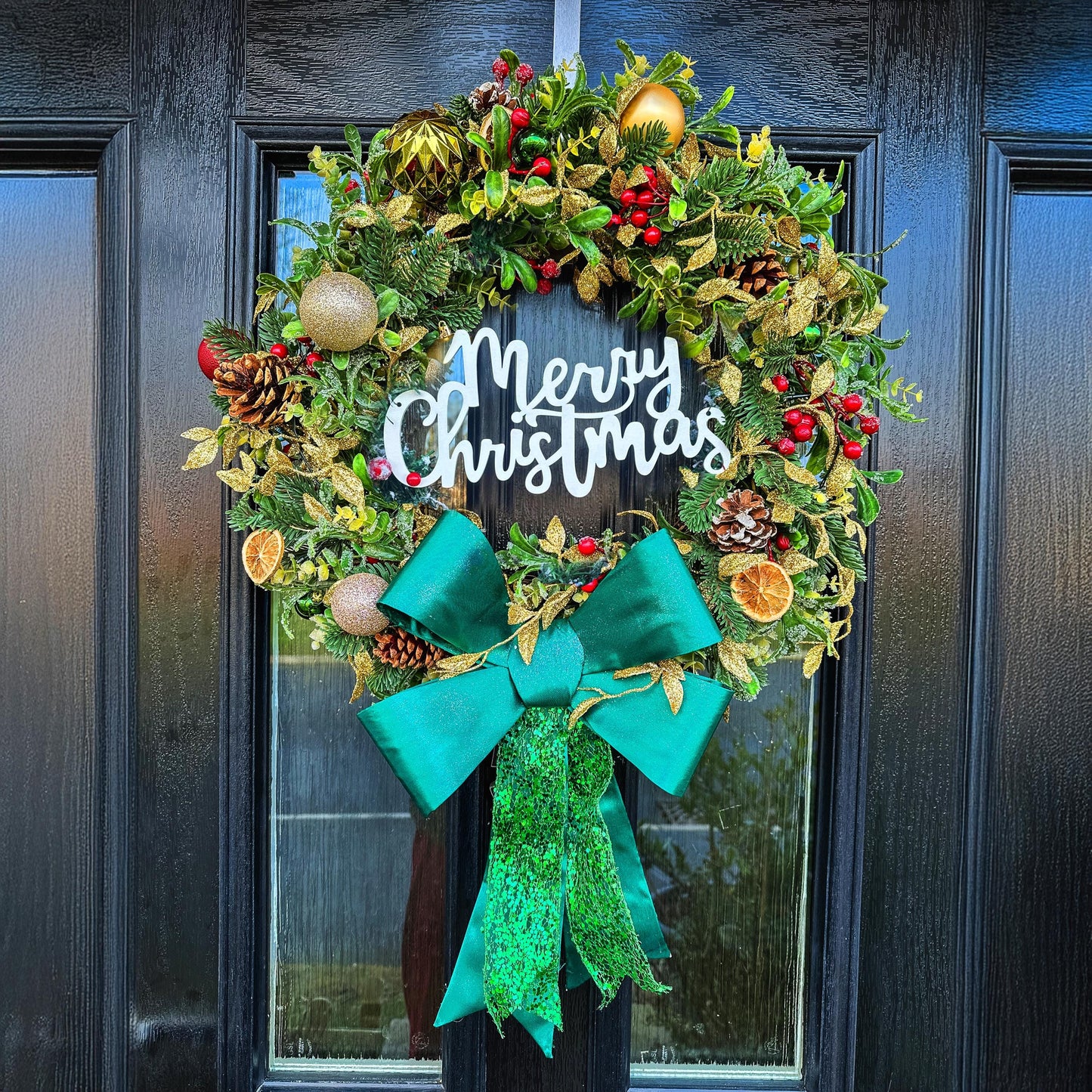 Luxury Christmas Wreath with Red Bow – Handmade Front Door Decoration – Pinecone & Bauble Holiday Wreath with “Merry Christmas” Sign mossartbyrishstudio